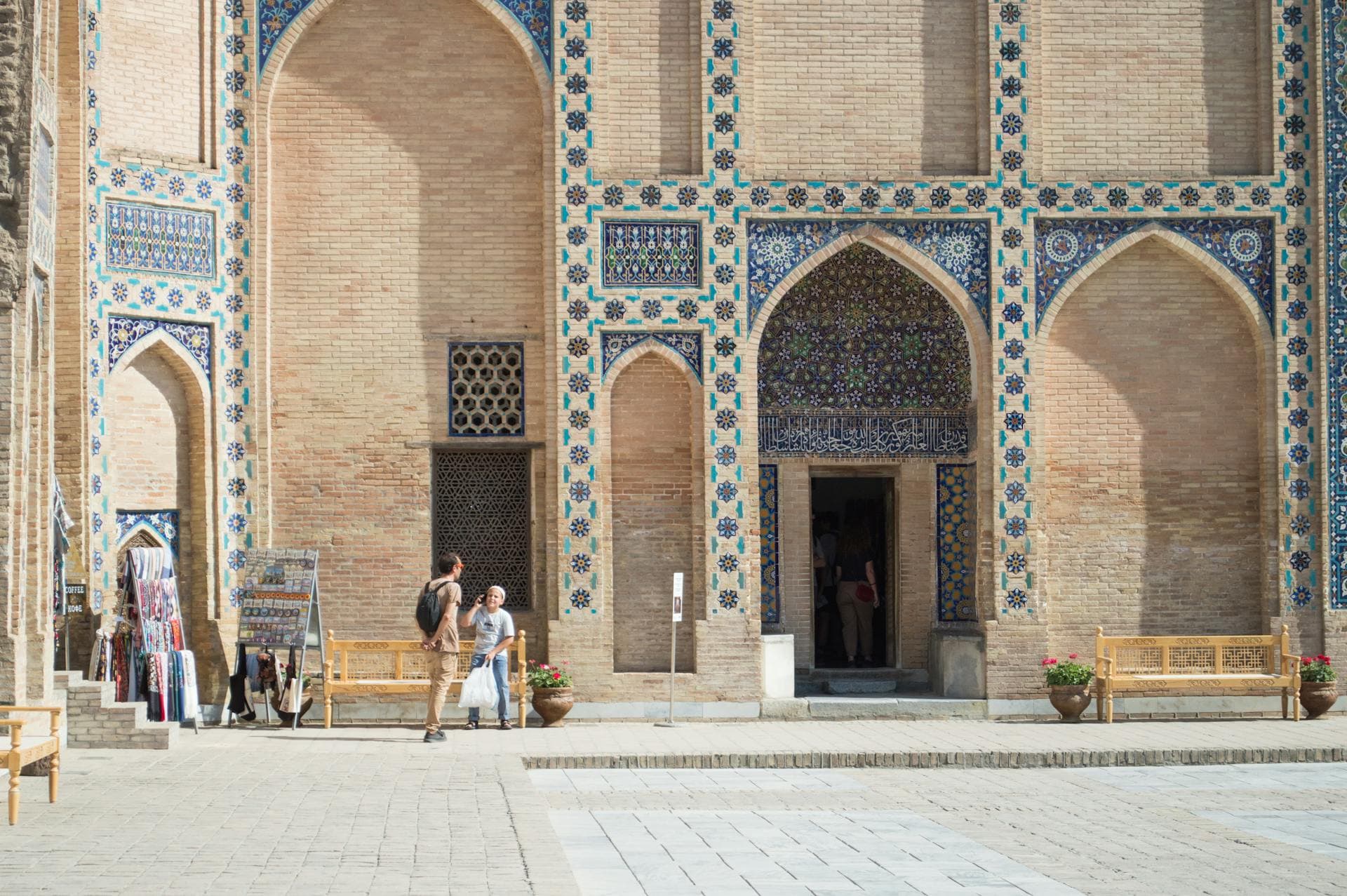 The Registan in Samarkand at golden hour, three tiled madrasas framing the open square along Uzbekistan's Silk Road circuit